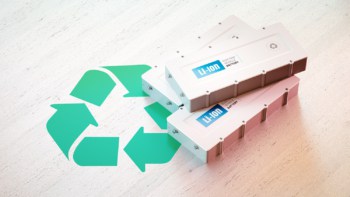 A stack of three lithium-ion batteries alongside a recycling symbol